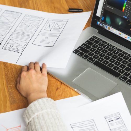 female-designer-reviewing-wireframes